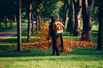 woman-operating-heavy-duty-leaf-blower